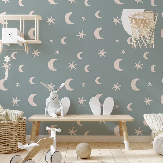 Danica Blue Boho Stars And Moon Nursery Wallpaper In Childrens Bedroom With Wooden Bench, Basketball Hoop and Planes