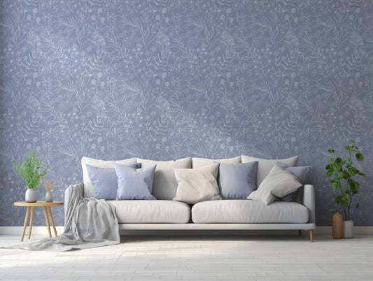 Estelle Wallpaper In Living Room WIth Blue And Grey Sofa And Green Plants