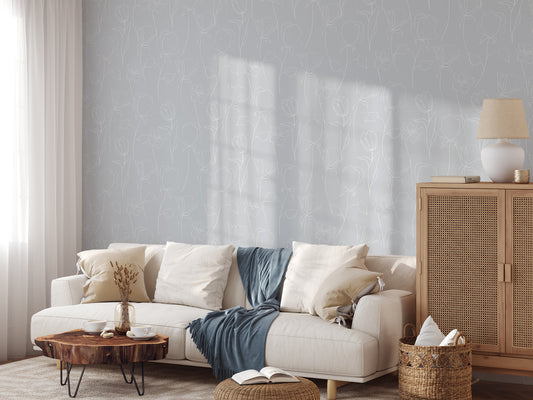 Neriah Wallpaper With White Sofa With Blue Blanket and Coffee Table Made From a Tree