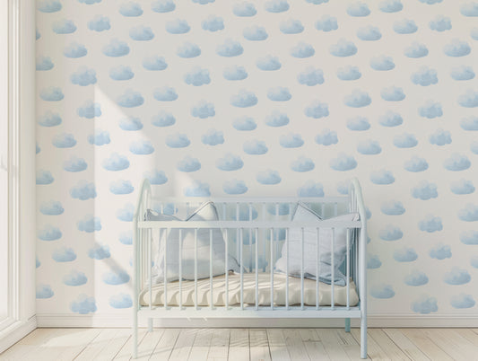Nilima Wallpaper In Bright Natural Lit Nursery With Baby Blue Cot With Light Blue Pillows
