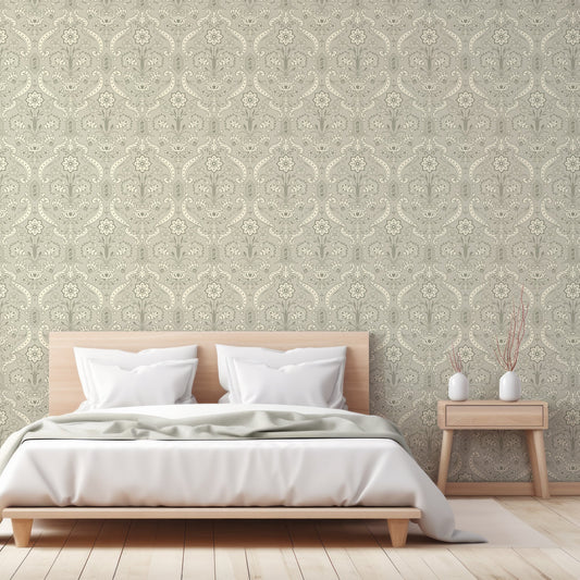 A bedroom with the pastel green wallpaper featuring a vintage damask pattern with ornate floral and baroque-inspired motifs in soft cream tones.