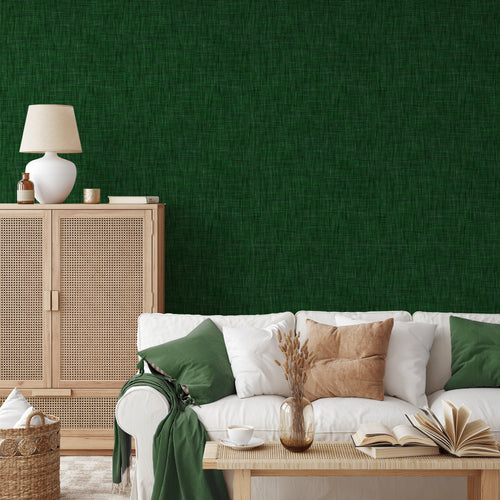 Emerald White Sofa With Blue Cushions and Open Books on Coffee Table