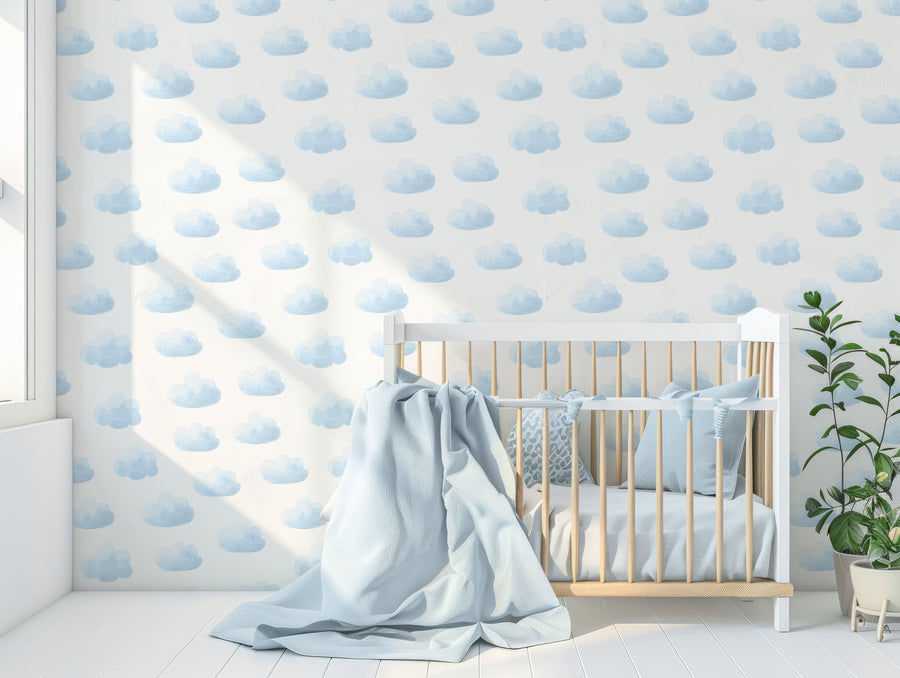 Nilima Wallpaper In Nursery Room With Baby Blue Cot & Large Blanket & Green Leafy Plant
